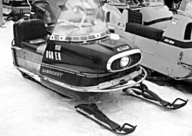 Mercury 220 next to some old ski-dog